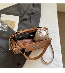 Interior view showing the large capacity of the brown tote bag for essentials