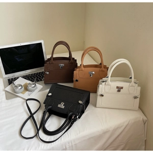 Litchi pattern leather handbags in four colors with metal buckle and shoulder straps