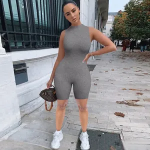 Detailed view of grey sleeveless slim fit romper with racerback design in street style