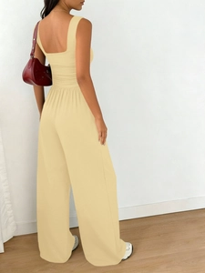 Detailed back view of a light yellow square-neck sleeveless top and wide-leg trousers set