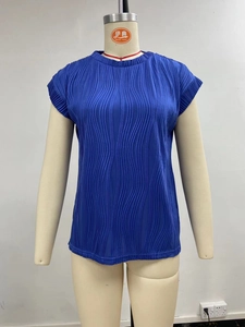 Detailed view of royal blue pleated texture on summer short sleeve loose round neck top