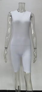 Close-up of white ribbed fabric texture on a slim-fit athletic women's jumpsuit