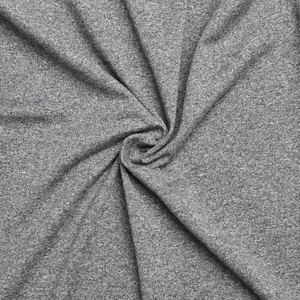 Macro shot of high-quality heather grey knitted polyester fabric with soft texture