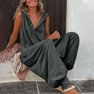 Detail of dark grey sleeveless hooded jumpsuit with button neck and drop crotch design