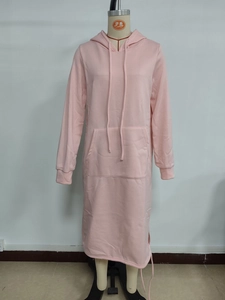 Detail of pink long-sleeve hooded sweatshirt dress with kangaroo pocket and side slits