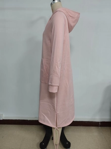 Detailed side view of pink longline hoodie dress with side slit and drawstring pocket