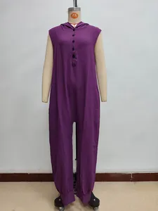 Detailed view of purple hooded sleeveless jumpsuit featuring front black buttons and crinkled fabric