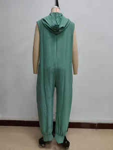 Rear view of a sage green sleeveless hooded jumpsuit with crinkle textured fabric detail