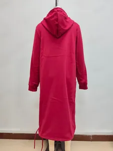 Back view of a long red hoodie dress featuring a drawstring hood and ribbed cuffs