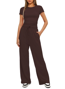Detailed view of high-waisted wide-leg trousers with drawstring and elastic waistband