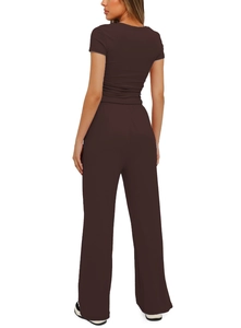 Detail of chocolate brown short sleeve top and high waisted wide leg trousers set