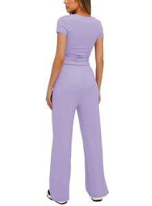 Rear view of lavender two-piece leisure set showing short sleeve top and high waist pants
