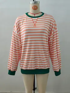 Detail of striped long sleeve tee with contrast green ribbed collar and triangle stitching