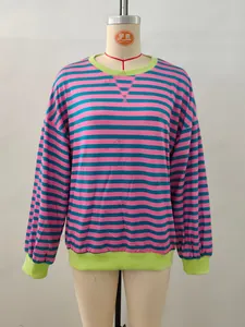 Detail of round neck long sleeve striped sweatshirt with yellow ribbed collar and cuffs