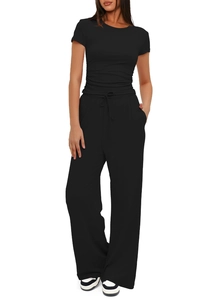 Detail view of the black lounge set featuring a drawstring waist and wide-leg trousers