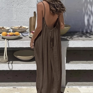 Deep brown backless maxi dress with spaghetti straps and tie-back detail for summer