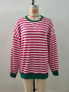 Detail of red and white striped long sleeve top with green ribbed collar and hem stitching