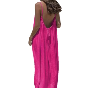 Hot pink backless maxi dress with spaghetti straps and tie-back detail for summer