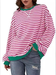 Women's pink striped long sleeve sweatshirt with green ribbed cuffs and crew neck