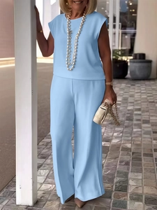 Women's light blue two-piece set featuring a sleeveless round neck top and wide-leg pants