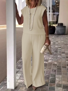 Elegant beige sleeveless crewneck top and high-waist wide-leg pants two-piece set