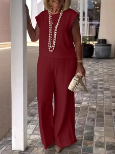Women's burgundy two-piece set with sleeveless round neck top and wide-leg trousers