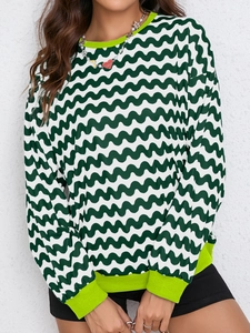 Women's crewneck sweatshirt with green wave pattern and bright ribbed knit cuffs