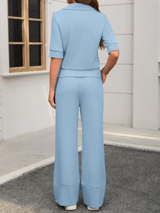 Detailed back view of light blue short sleeve set with elastic wide-leg trousers