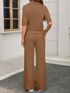 Rear view of brown two-piece leisure set featuring short sleeve top and wide leg pants