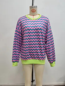 Detail of the wave patterns and vibrant ribbed neckline on the women long sleeve sweatshirt