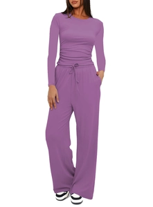 Detail of lilac high-waisted wide-leg pants with drawstring waist and side pockets