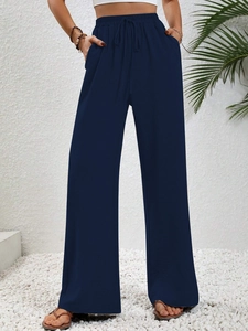 Women's high waist wide leg pants in navy blue with elastic drawstring and pockets