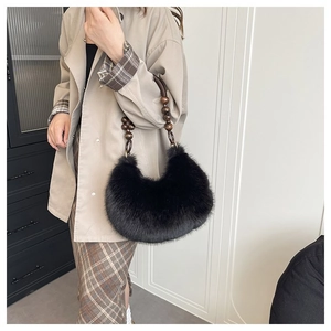 Chic black faux fur hobo bag with vintage wooden beaded strap for women