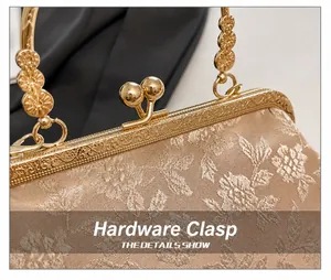 Detail of vintage champagne jacquard evening bag with engraved gold kiss-lock and metal handle