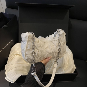 White 3D floral lace baguette bag with silver chain strap and romantic rose patterns