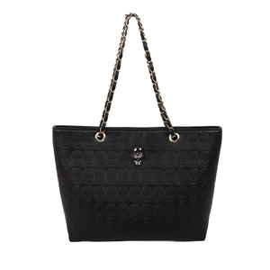 Gothic black tote bag featuring skull embossed pattern and metal skull hardware
