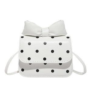 Chic white polka dot crossbody bag with a large bow detail and PU leather finish