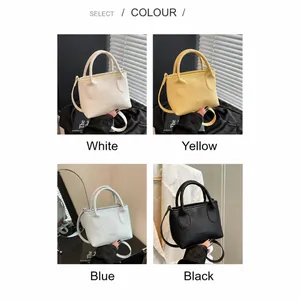 Four minimalist textured leather bucket bags in white, yellow, blue and black colors