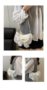 Detailansicht der weißen Jacquard-Tasche mit Organza-Schleife und Perlenkette