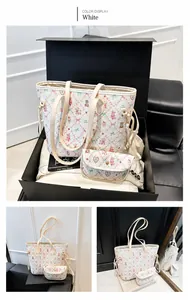 Détail du lot de 2 sacs avec imprimé cartoon dans un coffret cadeau noir haut de gamme