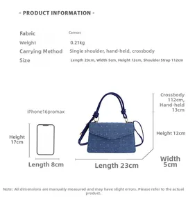 Tableau des tailles d'un sac bandoulière en toile bleue avec dimensions et échelle