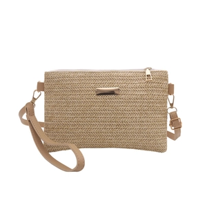 Handwoven straw crossbody bag in natural color with gold zipper and detachable straps