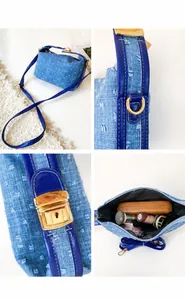 Detailansicht der blauen Denim-Textur, goldener Schnalle und des Tascheninnenraums