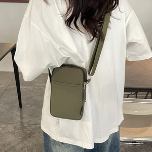 Olive green minimalist crossbody phone bag for women with wide strap and zip pocket