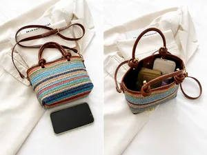Detail of colorful striped straw bag showing interior compartment for phone and lipstick