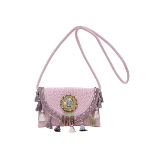 Roze bohemien handgeweven crossbody tas met kleurrijke kralen en kwastjes