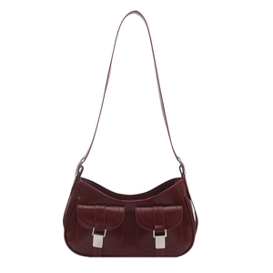 Minimalist burgundy underarm bag with glossy finish and double front pockets