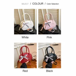 Bolso estilo bowling con lazo en colores blanco, rosa, rojo y negro con correas largas