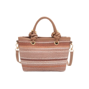 Chic striped straw tote bag with leather handles and detachable strap for summer vacations