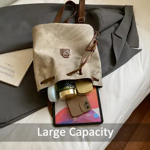 Detailed view of the large capacity interior of this vintage khaki commute backpack